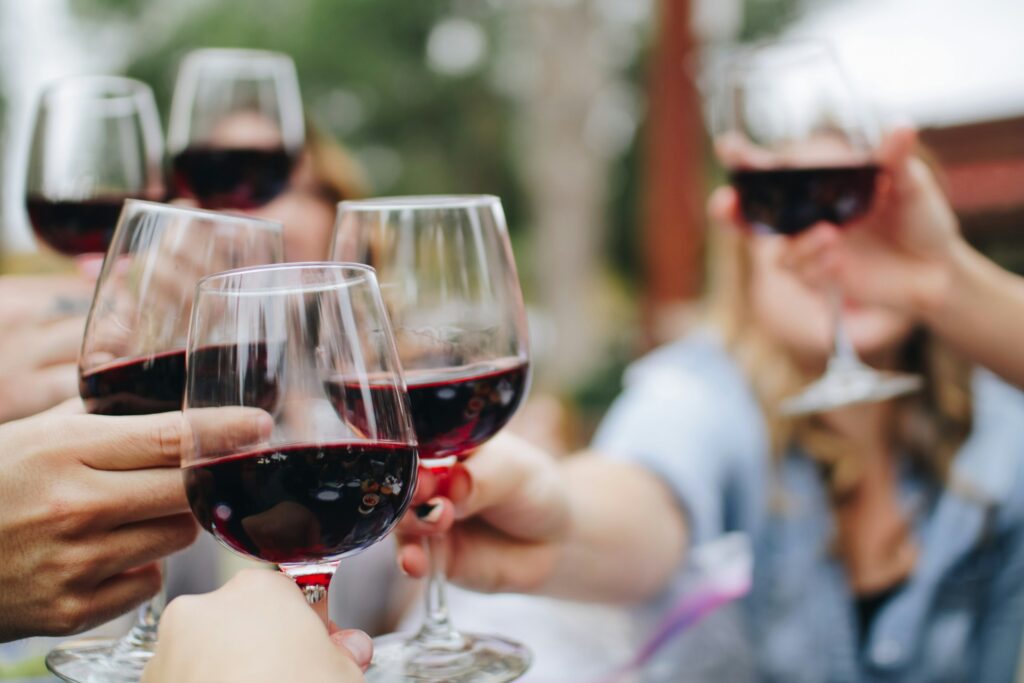 Friends toasting in redwine
